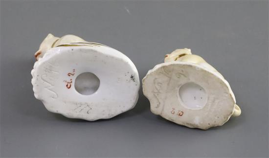Two Rockingham porcelain figures of seated pugs, c.1830, H. 6.4cm and 5.5cm